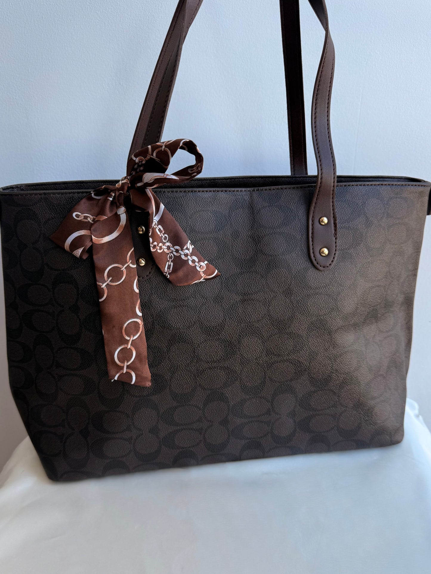 Cartera COACH oscura