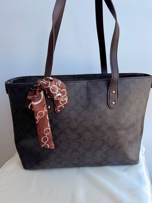 Cartera COACH oscura