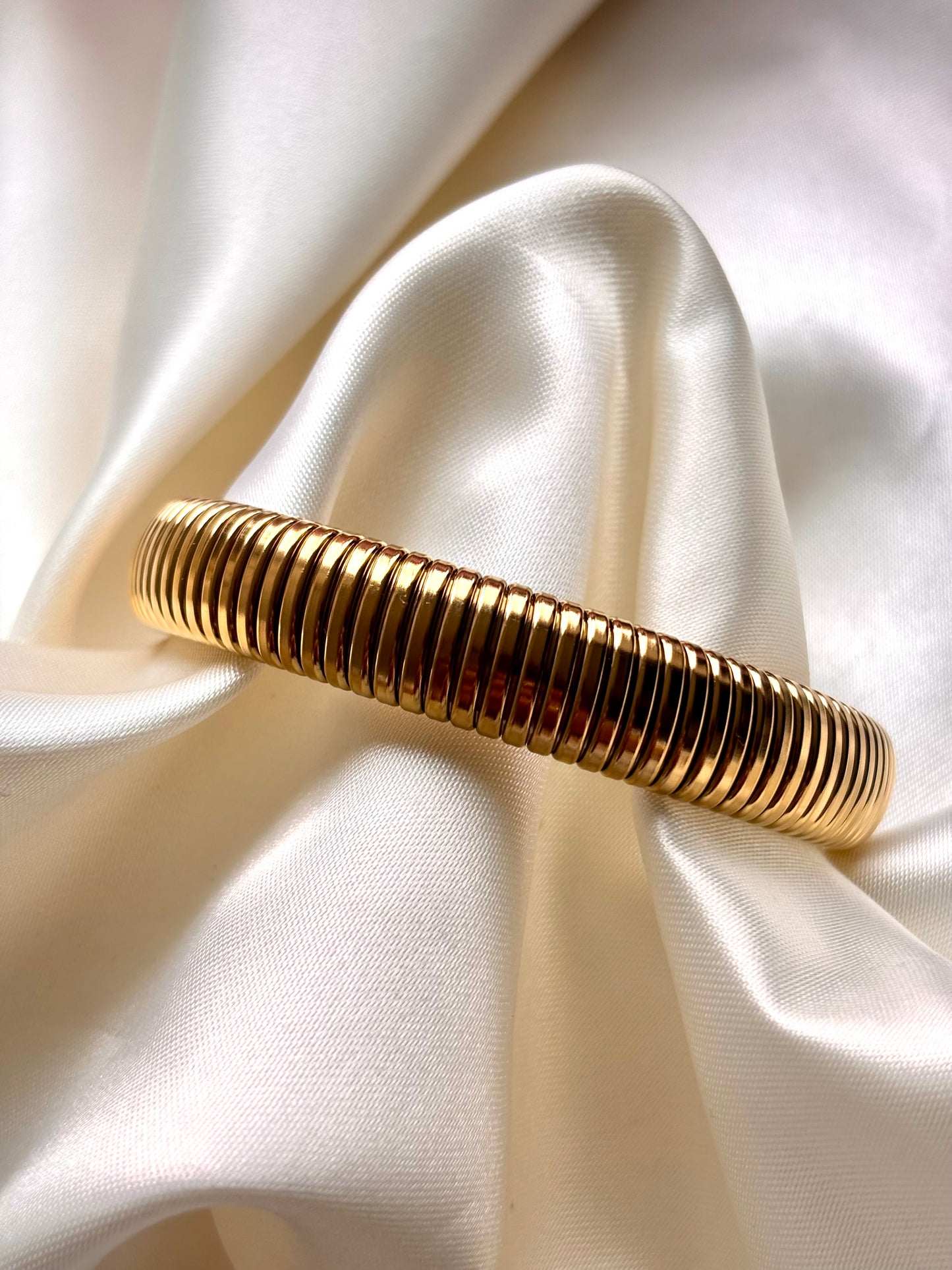 Brazalete RESORTE DORADO DELGADO