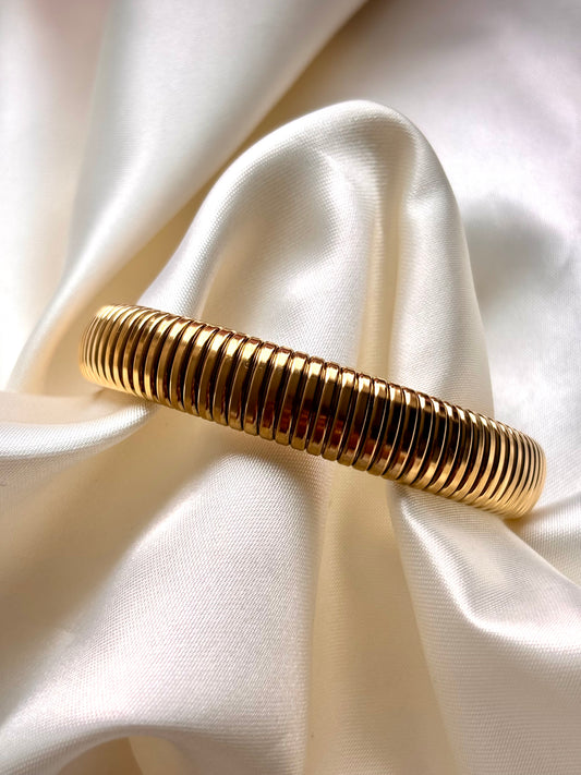 Brazalete RESORTE DORADO DELGADO