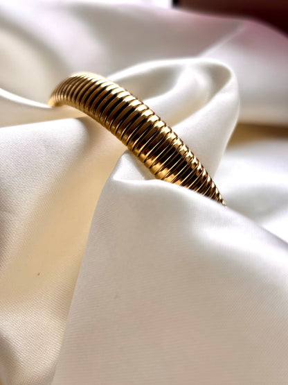 Brazalete RESORTE DORADO DELGADO