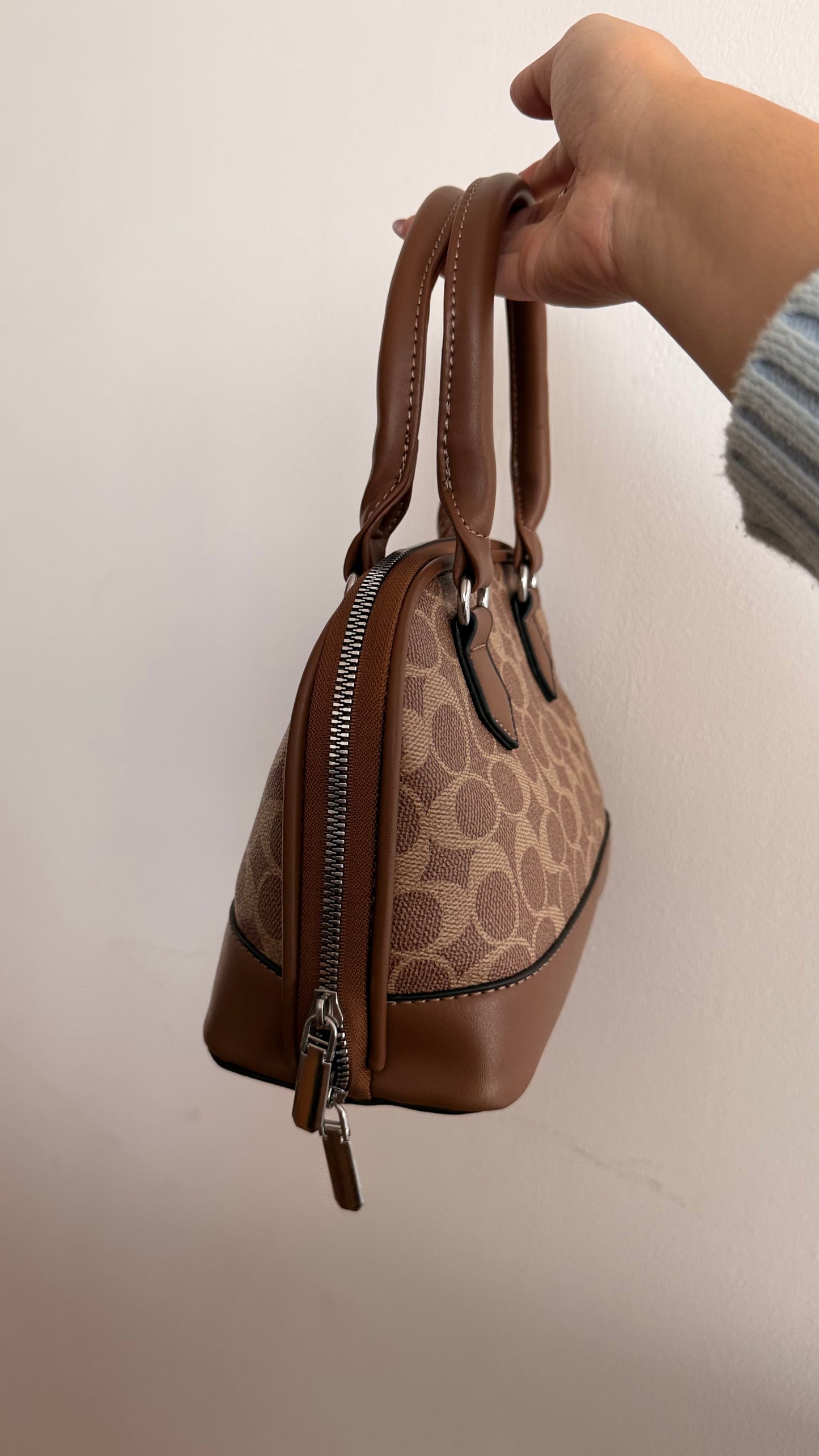 Cartera coach mediana café
