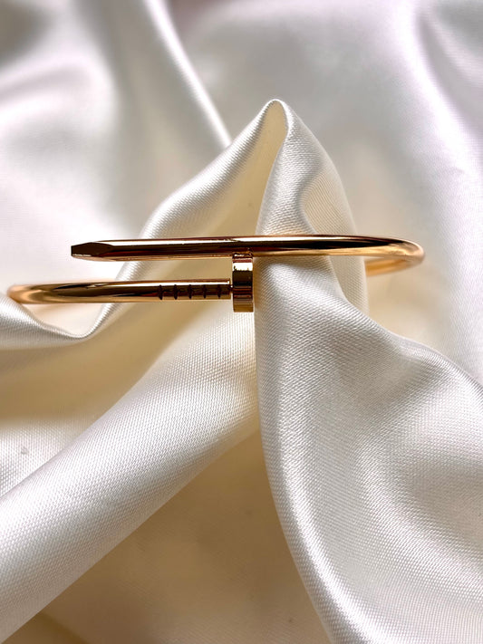 Pulsera CLAVO DORADO DELGADA remarcada