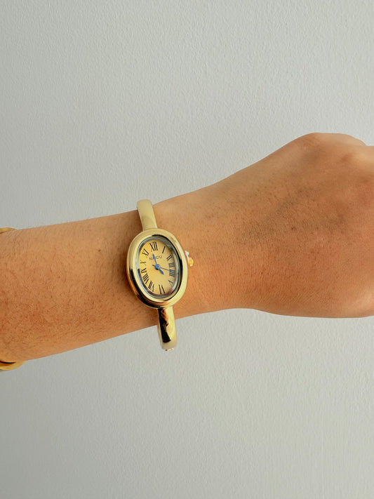 Reloj vintage cara dorado