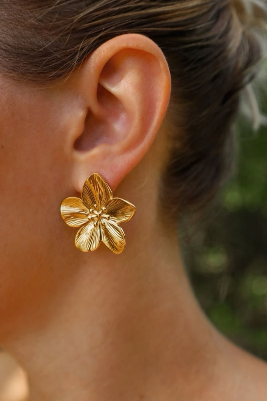 Aretes florecer